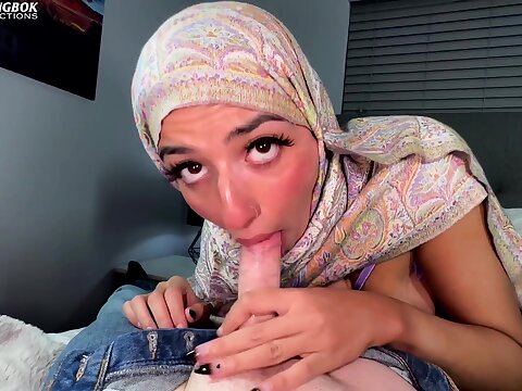 Youthful Hijabi Aaliyah, wearing a